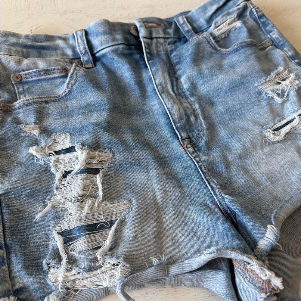 American Eagle Light Blue Denim next level stretch distressed Jean shorts size 8